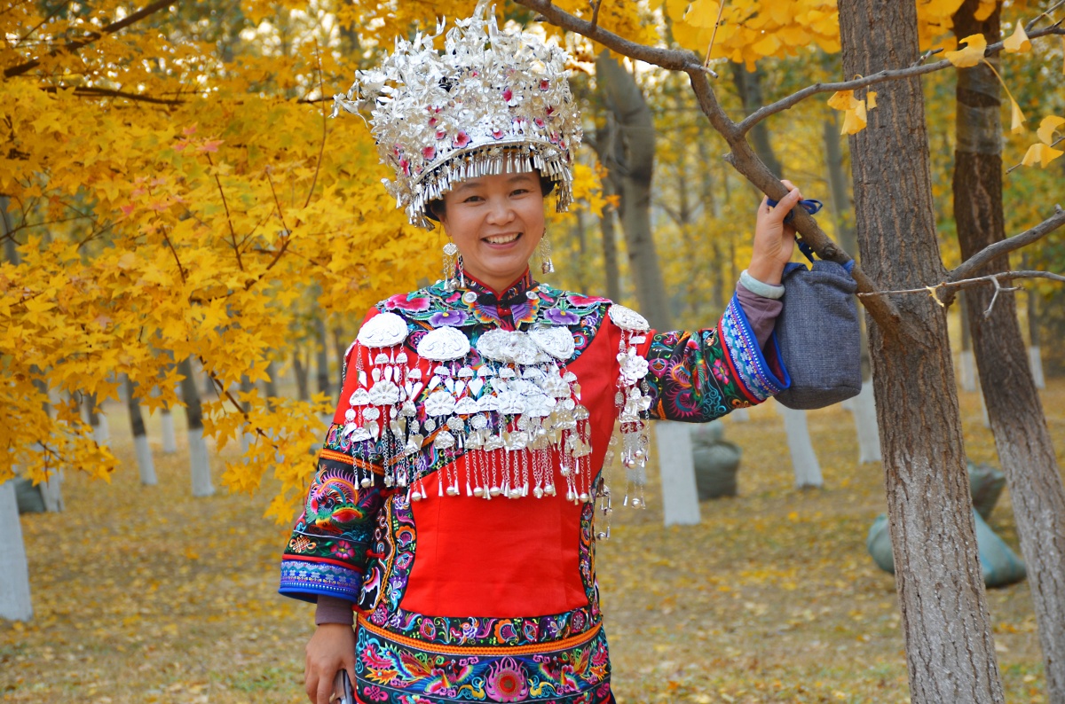 中国民族服饰十佳设计师,重庆市妇联妇女代表,酉阳土家族苗族自治县