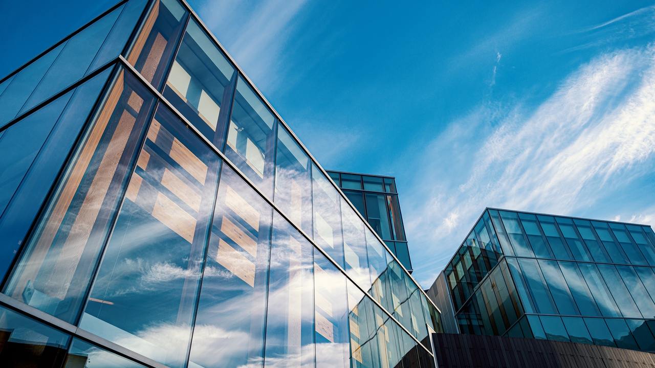 low-angle-photo-of-glass-buildings-2599538.jpg