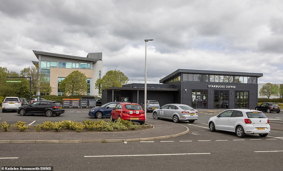 28397974-8320405-Cars_queue_at_the_Starbucks_in_Livingston_West_Lothian_Scotland_-a-14_1589477571331.jpg